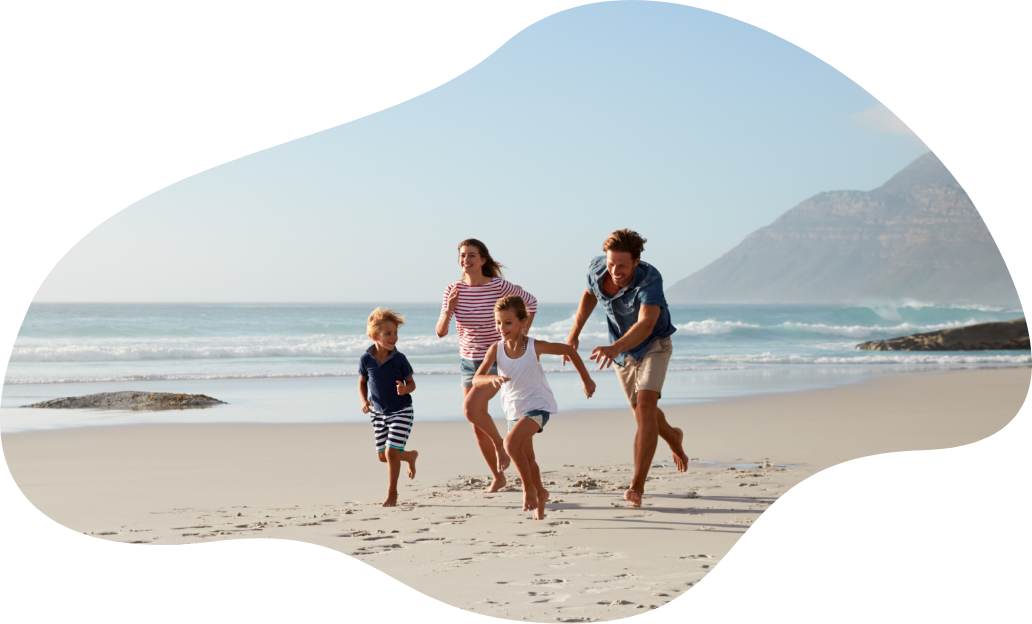 Family have fun on the beach